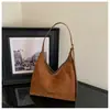 Bolso grande de mujer retro, nuevo bolso de moda de ante tipo albóndiga para el otoño de 2026, bolso cruzado informal para el día a día