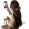 Pinza de Plátano de Hilo Tejido de Flor para Cola de Caballo de Otoño e Invierno Accesorio Vertical para el Cabello Pinza de Pelo de Felpa Nuevo Estilo 2026 para Mujer