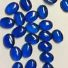 A fábrica tem a superfície lisa da safira sintética 3*5 a 10*12 a superfície azul de imitação alta do ovo da cor do tesouro terminada jóia com pedra