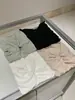 Wgwe9600 Guangzhou Shisanxing Roupa Feminina 2026 Verão Nova Camiseta Top Manga Curta Slim Fit Decote V