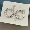Brincos de Moda Minimalistas de Alta Qualidade Ultra-Sensacionais com Superfície Fotossensível, Brincos de Pressão da Moda Sem Furos na Orelha
