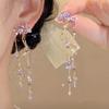 2024 nueva moda atmósfera moda púrpura anillo de diamantes completo aretes versátiles personalidad diseño nicho aretes exquisitos