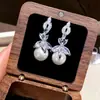 ¡Amante del Morado! Pendientes de Borla de Flor de Zircón Super Brillantes con Perlas, Pendientes de Nicho Delicados con un Toque de Lujo Ligero y de Alta Gama