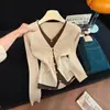Suéter de punto retro con bloques de color y cuello en V de manga larga estilo coreano personalizado de fábrica, nueva capa interior ajustada otoño 2026