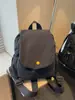 Mochila de Lona Transfronteriza para Mujer 2025 Nueva de Viaje Ligera Gran Capacidad Volteo Mochila Pequeña Simple Estudiante Bolsa Escolar