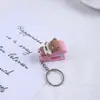 Grapadora Mini de Muñeca de Dibujos Animados Creativa Grapadora Portátil para Estudiantes Llavero Grapadora Papelería de Oficina y Estudio Venta al por Mayor