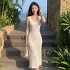 2026 Elegante Socialité Estilo Hong Kong Retro Seda de Hielo Encaje Hueco Vestido de Tirantes Dulce Picante Femenino Largo
