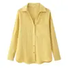 Ropa de mujer transfronteriza al por mayor 2026 nueva moda casual versátil color liso con botones manga larga cuello camisero top