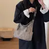 Bolso de gran capacidad para mujer, nuevo bolso cruzado de textura de nicho, bolso de hombro para estudiantes universitarios, bolso de mano para uso diario.
