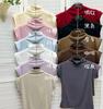 Camiseta Ribana de Manga Curta Slim Fit para Mulheres, Primavera/Verão 2025, Gola Meio Alta, Base Branca, Estilosa e Profissional para o Trabalho