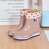 Botas de lluvia antideslizantes de moda para uso en exteriores, zapatos de goma para estudiantes, nuevas botas largas impermeables de moda para mujer, cómodas para damas