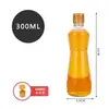 Garrafa de vidro de óleo de gergelim com tampa meia jin por jin frasco de perfume à prova de vazamento rosca comercial cônica selada garrafa vazia de óleo de gergelim
