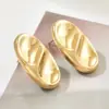 Europa y Estados Unidos estilo minimalista transfronterizo oro stud ovalado grueso diseño cóncavo-convexo pendientes de moda para mujer fiesta al por mayor