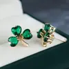 Pendientes de Trébol Esmeralda Cruzados Tang Jia para Mujer Pendiente Dorado de Lujo Ligero Pequeño Nicho Sensación de Alta Gama