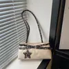 Bolso coreano de nicho con estampado de leopardo 2026, bolso de hombro tipo tote de motorista con bloques de color y decoración de cinturón, bolso de mano elegante y versátil para mujer