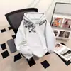 Sudadera con capucha floral estilo chino para hombre y mujer, nueva de otoño e invierno, corte holgado, estilo callejero, forrada de forro polar, sudadera para parejas