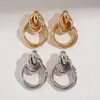 Pendientes Redondos Trenzados Geométricos Fotosensibles Metálicos Europeos y Americanos con una Personalidad Única, Pendientes de Nicho Transfronterizos de Alta Gama