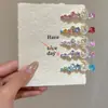 Pinza para el pelo de strass con forma de corazón de luna Dopamine Primavera Verano Exquisita Dulce Femenina Moda Lujo Ligero Único Pinza para el pelo Accesorios para el pelo