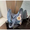 Bolso de mezclilla transfronterizo para mujer Gran capacidad 2025 Nuevo verano Versátil Nicho Un solo hombro Bandolera Bolso dumpling para ir al trabajo