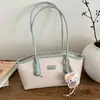 Bolso Pequeño Cruzado de Hombro Único para Mujer Primavera y Verano Nuevo Versátil para Axila 2026 Tendencia de Moda Bolso Tote para Viajes y Commuting