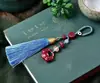 Cerradura de Paz y Buena Fortuna de Cinabrio Colgante para Teléfono Móvil Llavero de Coche para Mujer Cadena de Cordón de Arena Dorada Púrpura Colgante Joyería Colgante para Hombre