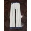 Jeans flare masculino para comércio exterior transfronteiriço para primavera e outono, estilo high street americano, legal e estiloso, caimento limpo, patchwork, calça de algodão reta que afina