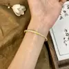 [Flor de cerejeira dourada] Pulseira de ouro Anel Novo estilo chinês Temperamento de sentimento frio Generoso Nicho de sentimento alto Presente simples