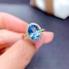 Anillo de Topacio Azul Suizo Natural Imitación de Bienestar de Drenaje de Transmisión Directa de Celebridad de Internet Super Flash Diamante de Alto Carbono Anillo para Mujer con Forma de Huevo
