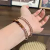 Pulsera de cuentas geométricas de circón y ojo de tigre estilo Maillard vintage, sensación de lujo ligero de alta gama, accesorio de mano moderno y único