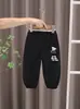 2026 Nuevo Modelo Pantalones para Niños Primavera y Otoño Corte Holgado Pantalones Casuales Elegantes Pantalones Deportivos para Bebés Niños Tendencia Venta al por Mayor