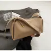 Bolso tipo almohada casual personalizado de diseño de nicho, bolso de primavera nuevo y moderno 2026, bolso de hombro y bandolera personalizado de moda