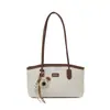 Bolsa feminina de luxo 2026 nova moda tendência versátil bolsa de ombro grande capacidade sacola de trabalho bolsa balde