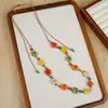Collar Largo de Cuerda Trenzada con Cuentas de Cerámica Bohemia Coloridas y Estrella de Mar para Mujer, Estilo Étnico Retro
