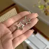 Hebilla de Oreja de Estrella de Cinco Puntas Estilo Coreano Simple para Mujer Diseño de Nicho Sentido de Diseño Pendiente de Oreja de Celebridad de Internet Personalidad Elegante Accesorios para Oreja de Estrella Moderno