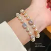 Pulsera de Perlas y Circonia Cuadrada Chapada en Oro Real de 18k Anillo de Mano de Lujo Ligero y Alta Gama Joyería de Mano Moderna y Versátil para Mujeres