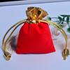 Bolsa de joyería de oro al contado, bolsa con cordón, bolsa de embalaje de joyería de regalo, bolsa de franela roja dorada al por mayor