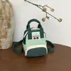 Mochila mini de moda versátil transfronteriza para mujer, otoño 2026, adecuada para ocio al aire libre, viajes y para llevar un teléfono.