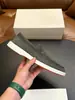 Zapatos casuales de tela de lujo ligero con plantillas de cuero genuino de capa superior STN, suelas gruesas ligeras, populares zapatos slip-on para hombre europeos y americanos
