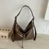 Bolso tote de gran capacidad estilo retro europeo y americano, nuevo modelo 2026, bolso de hombro y cruzado versátil de alta gama para el trabajo