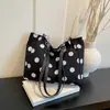 Bolso de moda transfronterizo 2026 verano nueva moda ligero elegante bolso de mujer lunares nicho simple versátil bolso de hombro