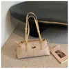 Bolso de axila para mujer, nueva colección de otoño 2026, bolso de hombro retro moderno y elegante, moderno y versátil, adecuado para el trabajo y los desplazamientos
