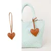 Colgante de Bolso Bufanda con Forma de Corazón Transfronterizo, Accesorio de Bolso de Moda con Borla de Cuero de Gama Alta Estilo Ins