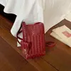Bolsa Exquisita Super Popular de Nicho com Textura Trançada Feminina 2026 Novo Estilo Moda Versátil Bolsa Transversal Mini Bolsa de Celular de Verão
