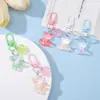 Llavero de oso de resina con lazo de macarrón transparente, colgante de corazón suave, llavero de cuentas DIY para niñas