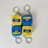 Venta al por mayor de fábrica cinta métrica mini de acero de alta calidad color negro puro 1 metro regla de cinta de acero regalo de publicidad con logo
