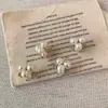 Pendientes de Nicho de Nuevo Estilo con un Ambiente de Alta Gama y Minimalista, con Diamantes y Perlas en un Diseño de Flor, Pequeños, Sencillos, Modernos y Versátiles