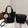 Bolso de cubo nuevo y sencillo, moda de primavera, bolso de hombro y bandolera minimalista texturizado, bolso de mano para mujer para el trabajo, bolso de exportación
