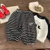 Pantalones de chándal a rayas para niño 2026 Primavera Nuevo estilo Pantalones jogger para niño Versátiles Pantalones largos Bebé Casual Modernos Geniales Estilo Delgado