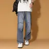 Marca da moda, novo estilo para primavera e outono, jeans patchwork estilo americano de nicho para adolescentes, calças compridas versáteis de corte solto para homens, estilo high street