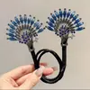 Pinza de pavo real retro de alta gama para mujer, herramienta para moño alto de flor en la parte posterior de la cabeza, clip de torsión para moño perezoso, accesorio para el cabello